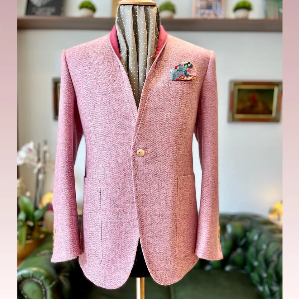 Rose herringbone one-button jacket with a soft standing collar and patch pockets.