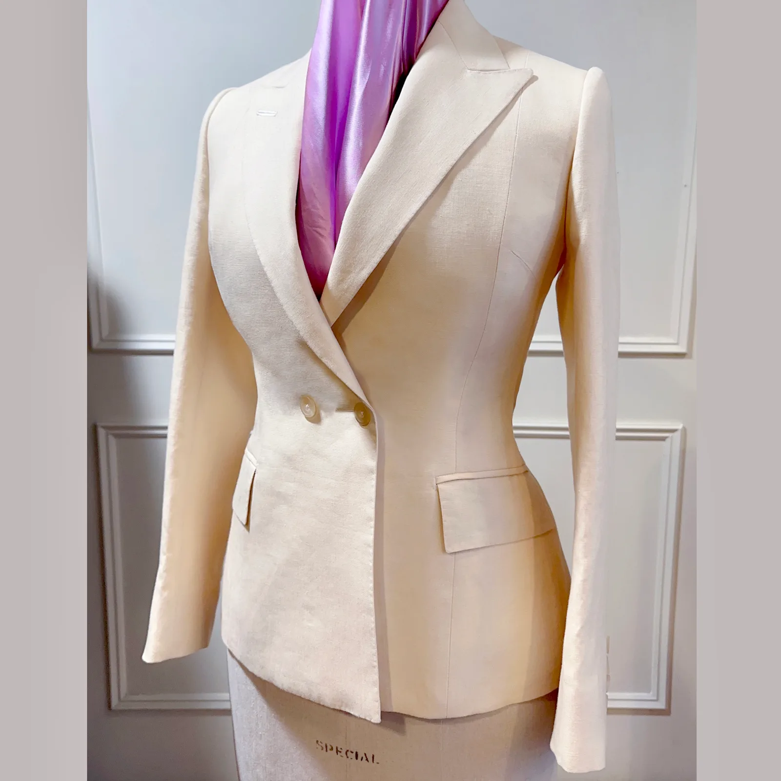 Front view of ivory basketweave ladies' jacket.